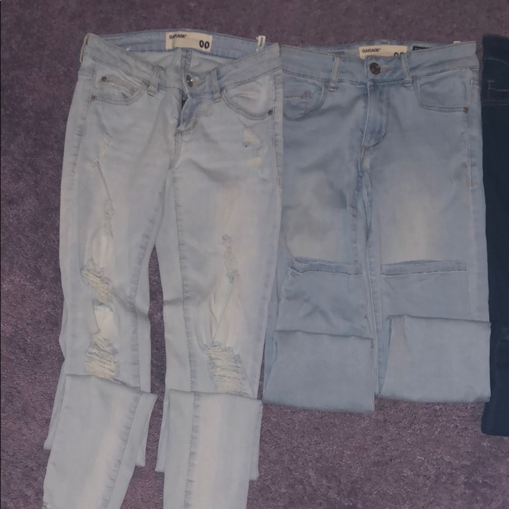 4 pairs of size 00 jeans from Garage.